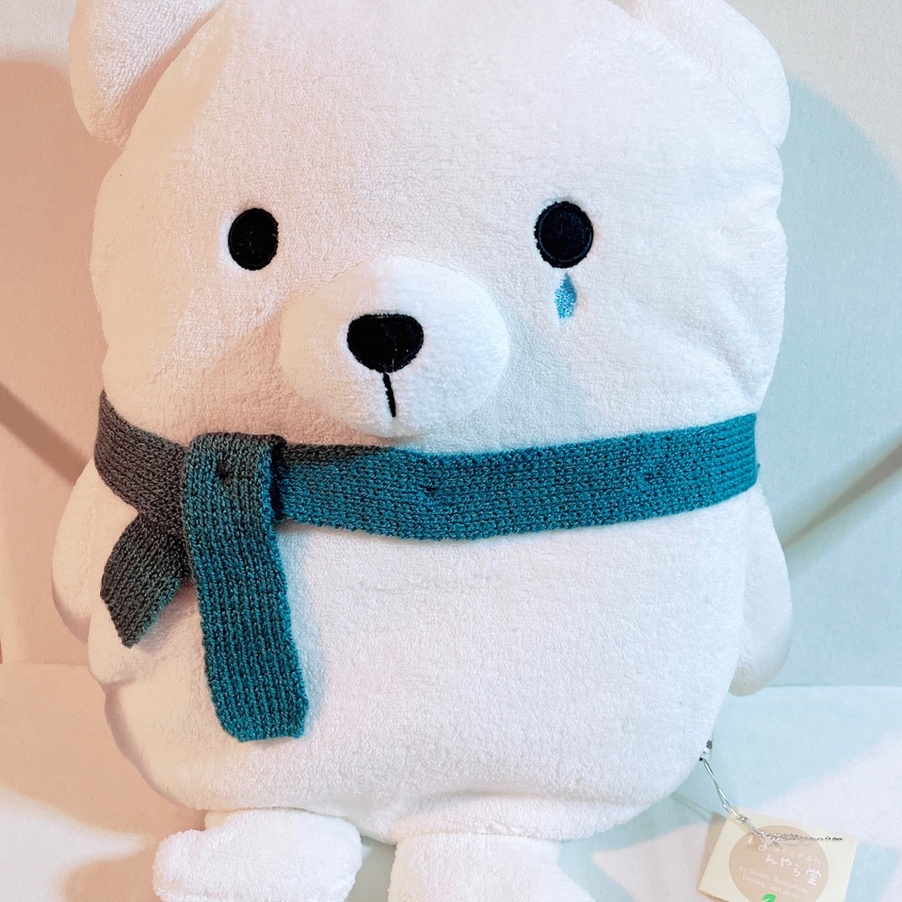Hot water bottle with soft polar bear cover